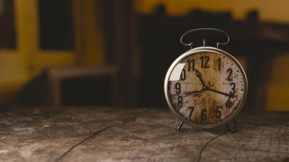 Analogue clock faces showing different times side by side